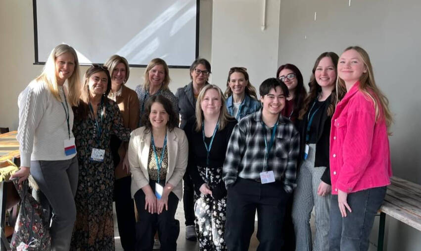 Group photo of GVSU graduate students and faculty at the 2025 MRA conference